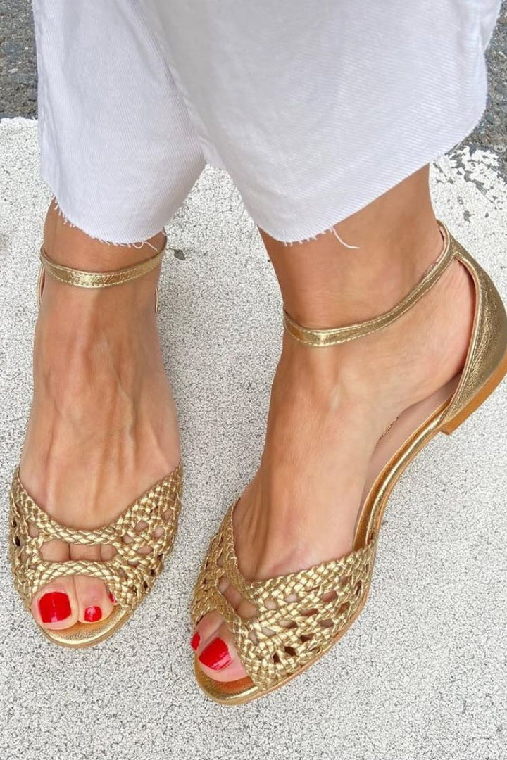 Elegant low cut-out woven sandals with open toe and ankle strap